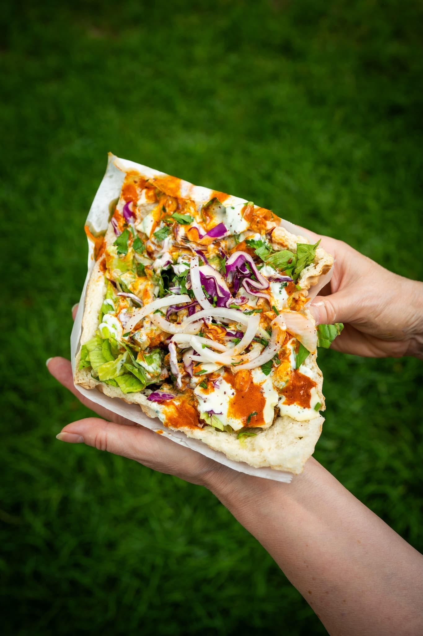 Hands holding a doner from Otto's