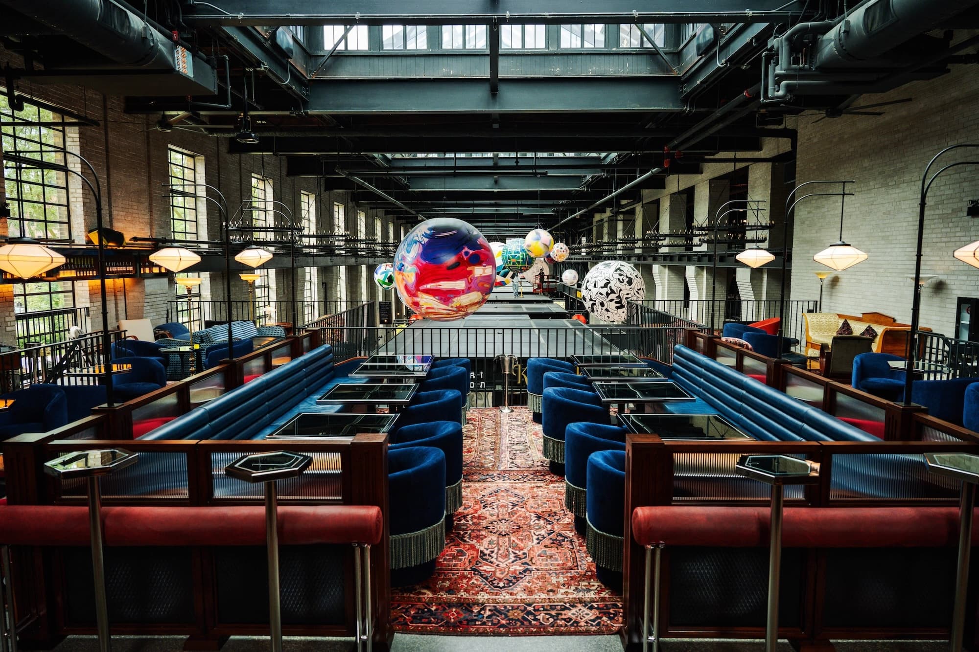 Civil Works Cocktail Bar looking out towards the art installation above the food hall.