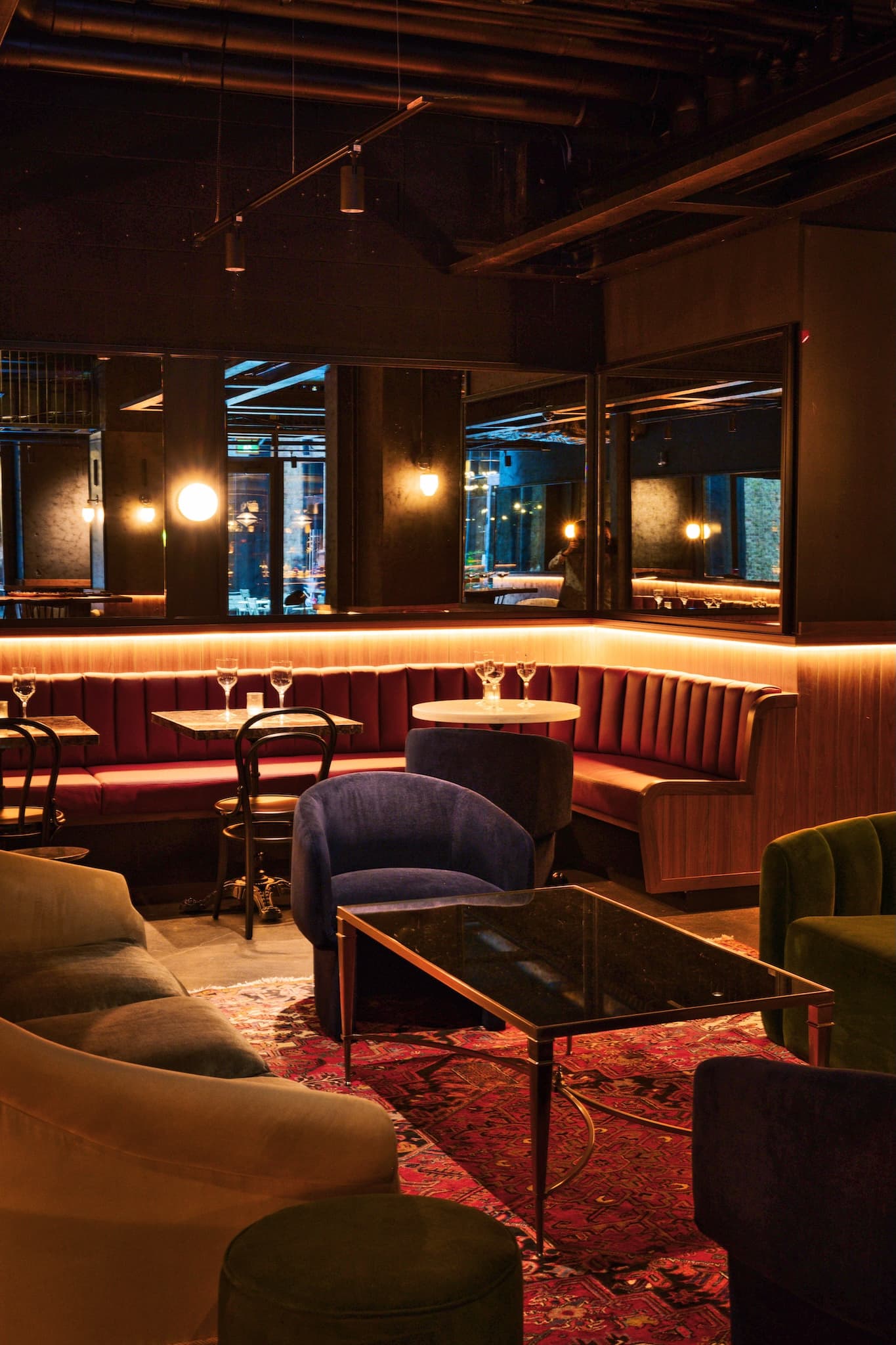 Leather banquettes and marble table tops in the lounge.