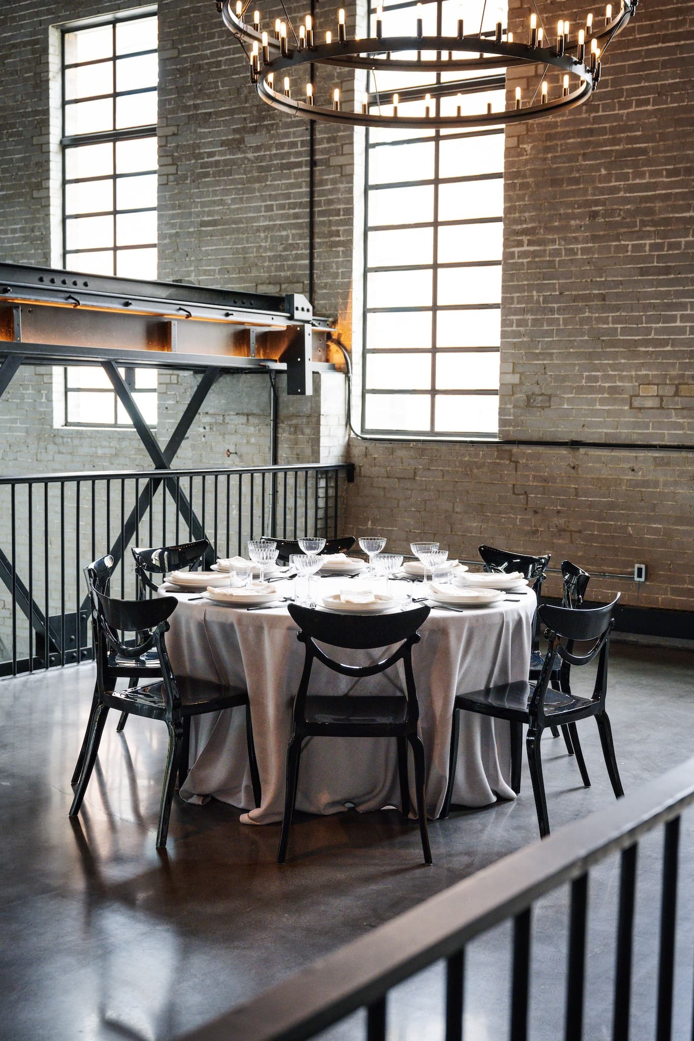 Round table set for a formal dinner