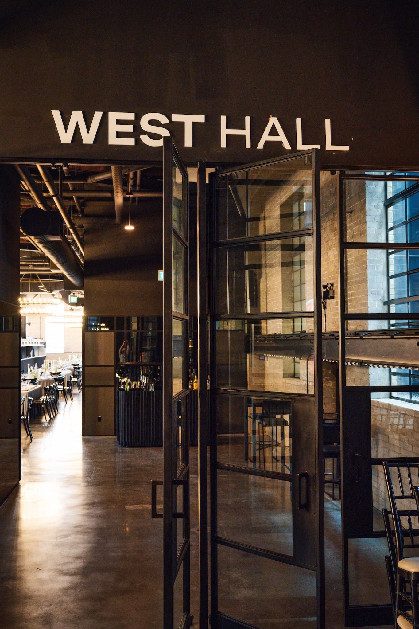 Glass door and entrance to the West Hall event space