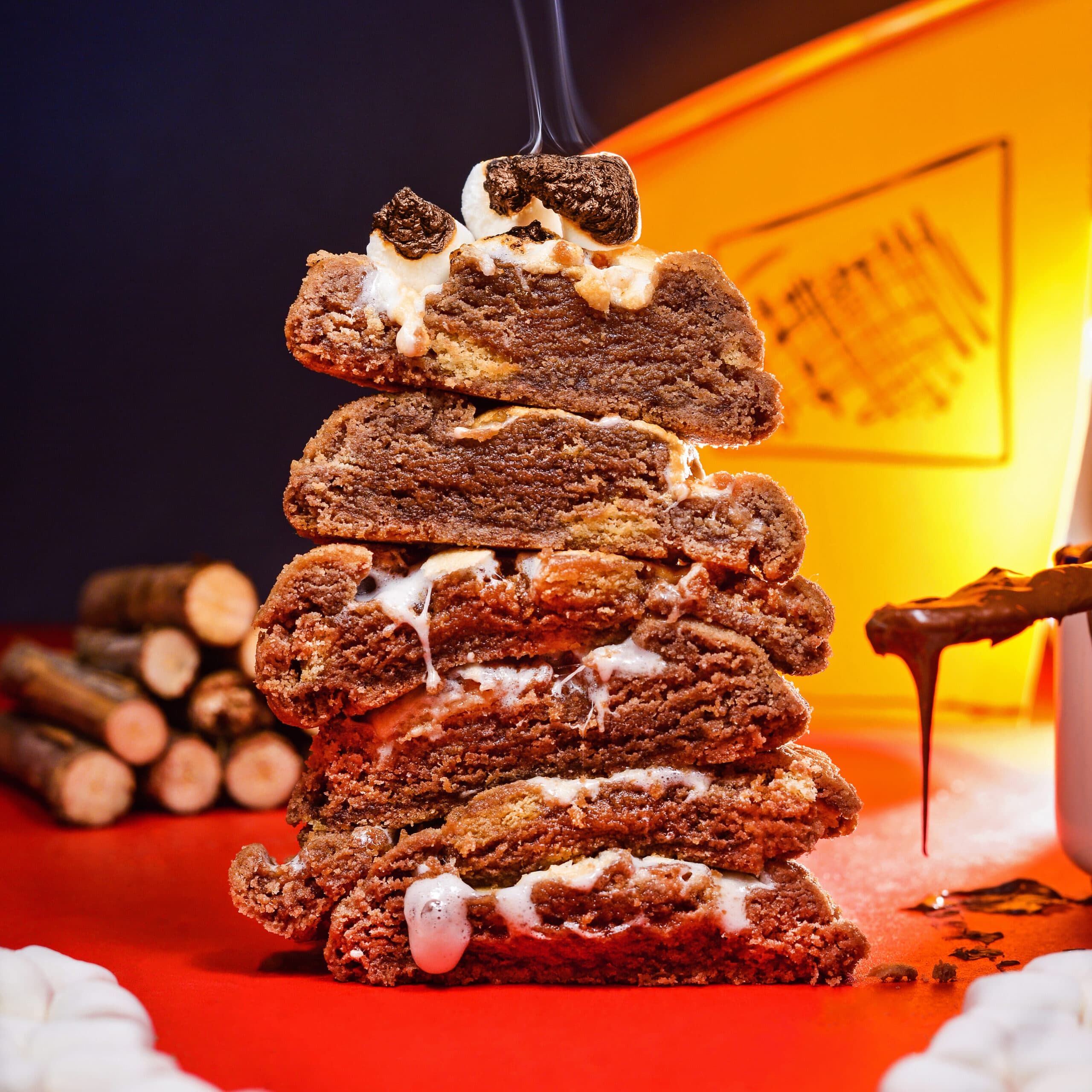 Stacked of S'more cookies with a roasted marshmallow on top